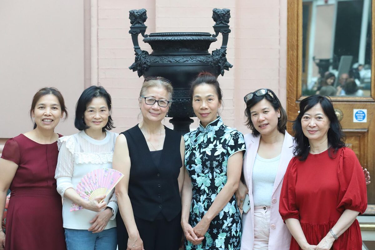 Helen with a small tour group inside a London gallery